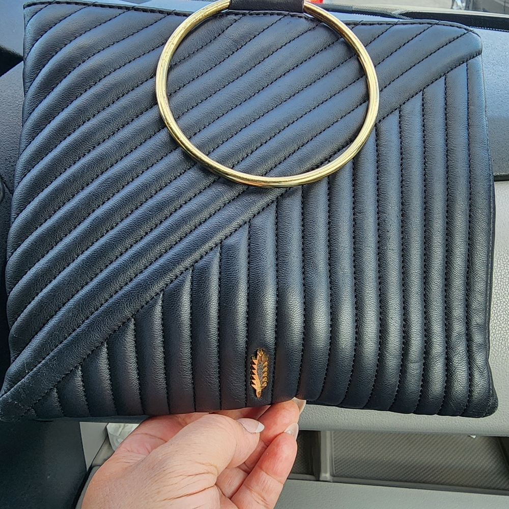 Chic Black Quilted Clutch with Gold Ring